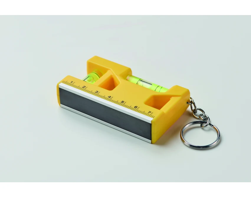 Żółty magnetyczny brelok z poziomicą, magnesem i linijką