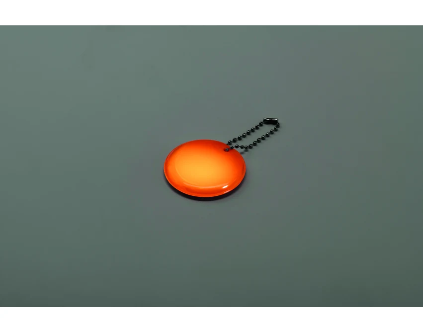 Brelok odblaskowy PVC pomarańczowy z logo dla firm