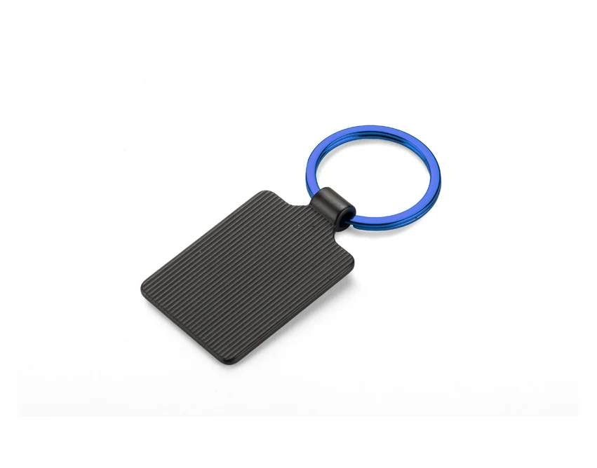 Brelok metalowy niebieski z grawerem logo COLORS