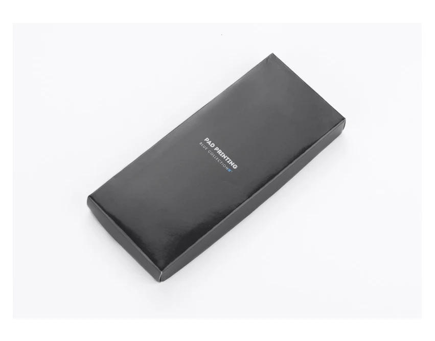 Brelok DERI czarny metalowo-skórzany z logo firmy