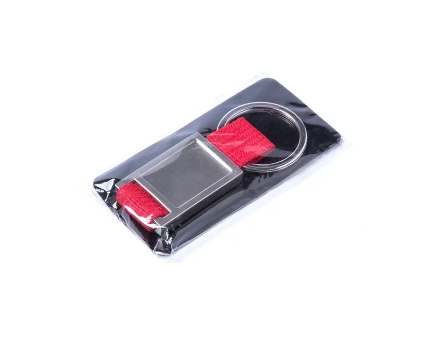 Czerwony brelok metal-poliester z domingiem 3D i logo