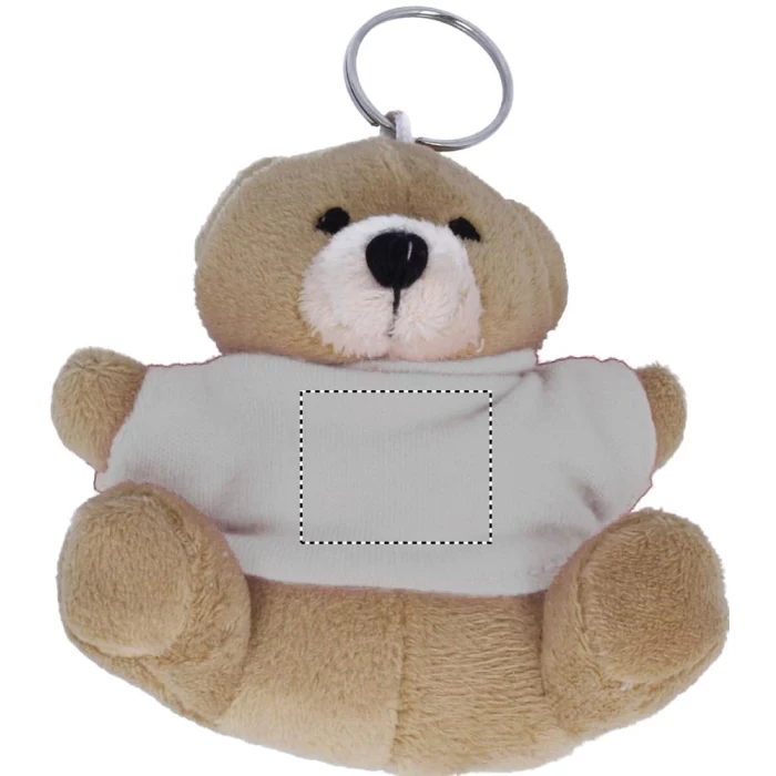 Schemat znakowania dla Termotransfer odblaskowy - TR na gadżecie: Biały pluszowy breloczek miś z logo na koszulce