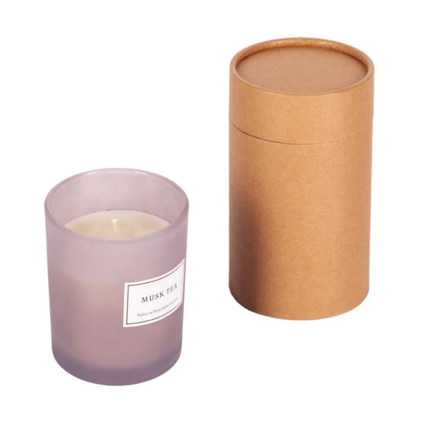 Szara świeca zapachowa Musk Tea z logo firmy w szkle
