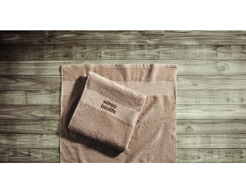 Ekologiczny ręcznik 100x50 z logo kość słoniowa, bawełna